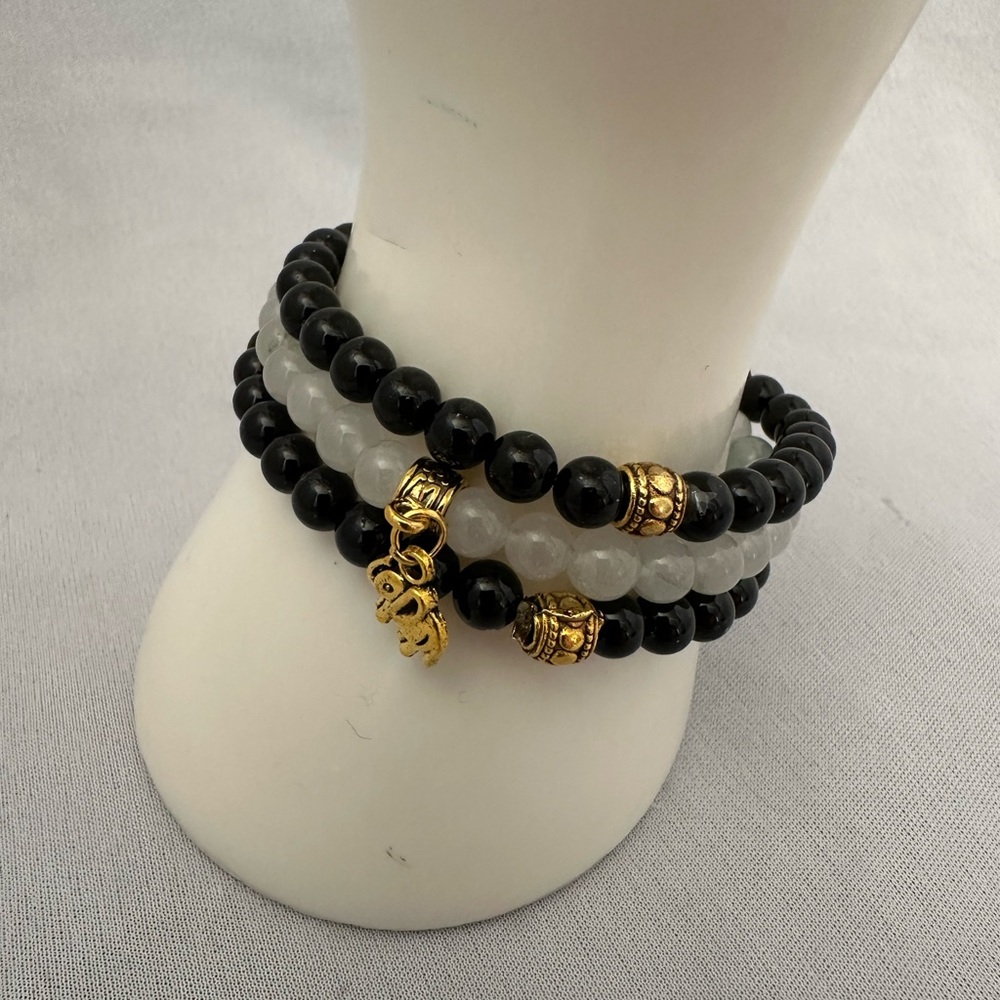 Handmade set of three 6mm stretch bracelets with black obsidian and quartz beads
